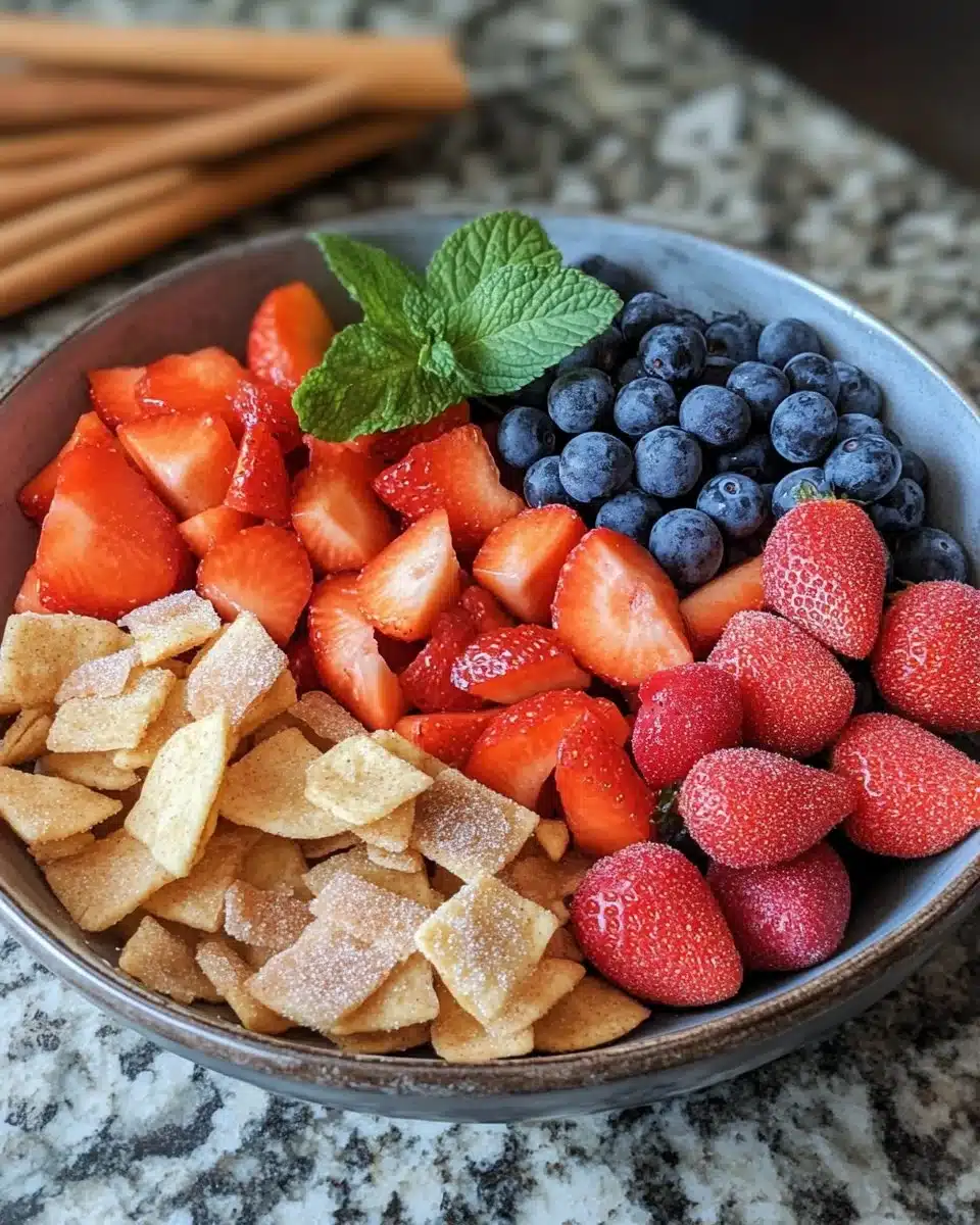 Delicious fruit salsa served with cinnamon sugar chips on a plate